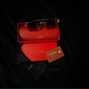 Cartier Men's Black and Gold Rimless Sunglasses